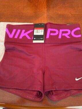 Nike 3”  length Women's Pro Maroon Training Shorts with Pink Logo Waistband